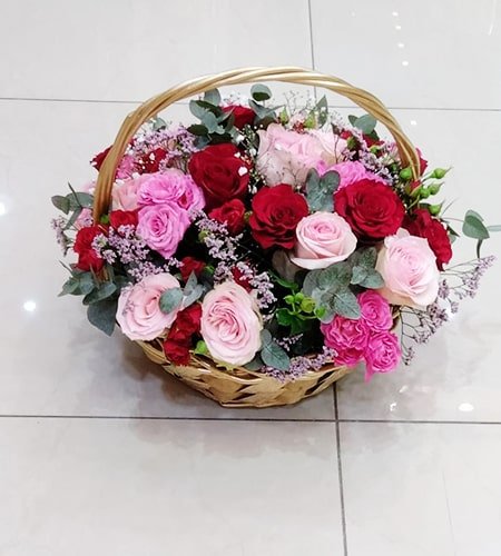 Handle Basket Mix Of Red Flowers
