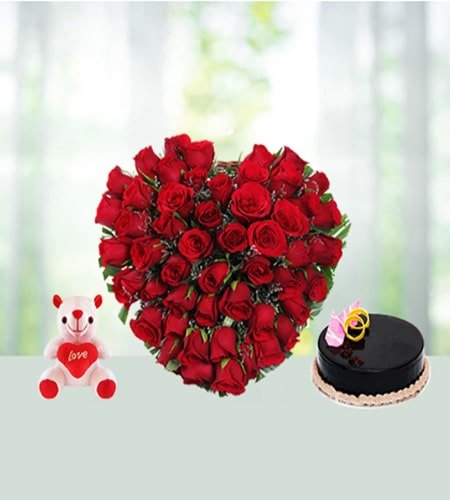 Appealing Cake And Teddy With Heart Shaped Arrangement